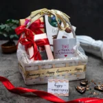 SEND ANNIVERSARY BASKET WITH MUG BY BELCO