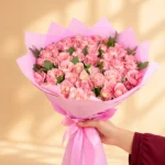 100 pink roses bouquet in elegant pink wrapping
