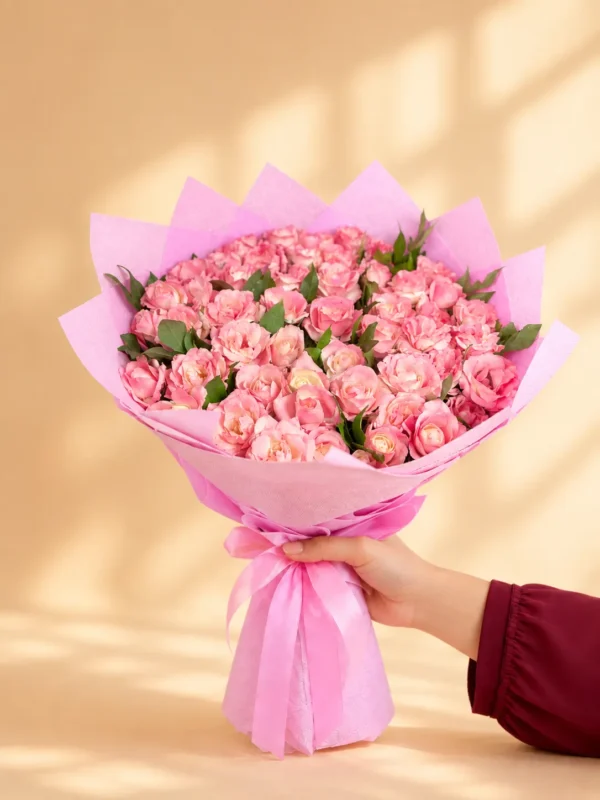 100 pink roses bouquet in elegant pink wrapping