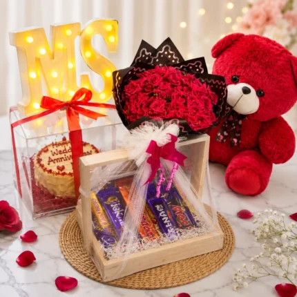 Anniversary Luxe with red velvet cake, roses, chocolates and heart balloons