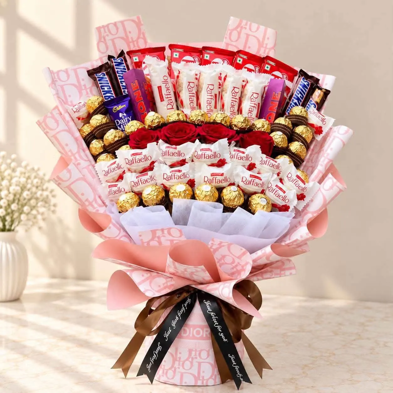 Grand Chocolate Rose Bouquet Chocolate rose bouquet with Ferrero Rocher, Raffaello, Toblerone, KitKat and red roses