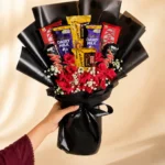 Midnight Indulgence bouquet with KitKat Mars Dairy Milk roses and Gypsophila