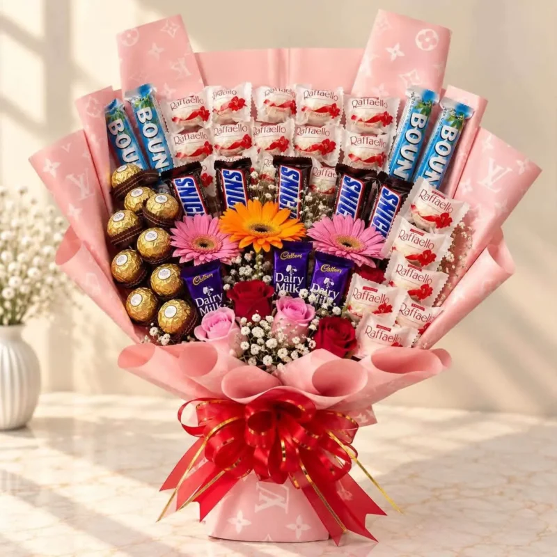 Pink chocolate bouquet with Raffaello, Ferrero Rocher, Bounty, roses and daisies