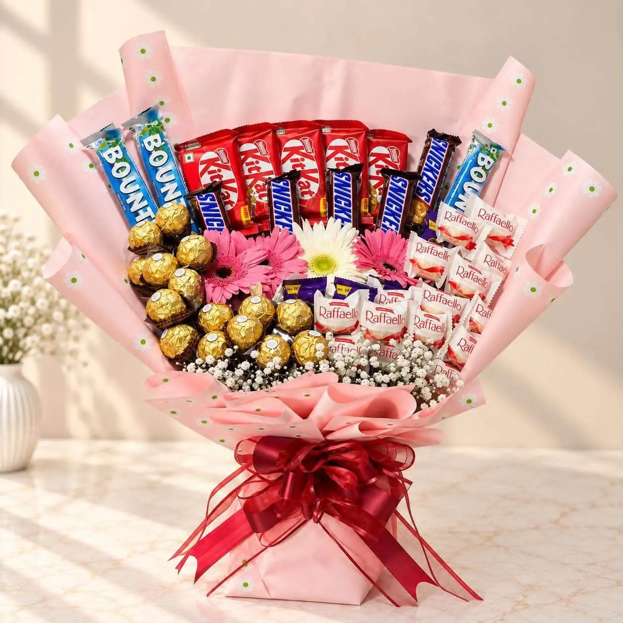 Rose Candy Chocolate Bouquet Chocolate bouquet with Bounty, Snickers, KitKat, Raffaello, Ferrero Rocher and daisies
