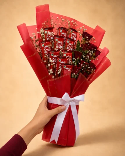 Scarlet Indulgence bouquet with 10 KitKat chocolates 10 red roses and Gypsophila