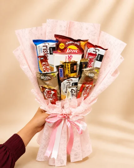 Sweet Snack Charm bouquet with Frisky wafers chocolates biscuits and snacks in pink wrapping